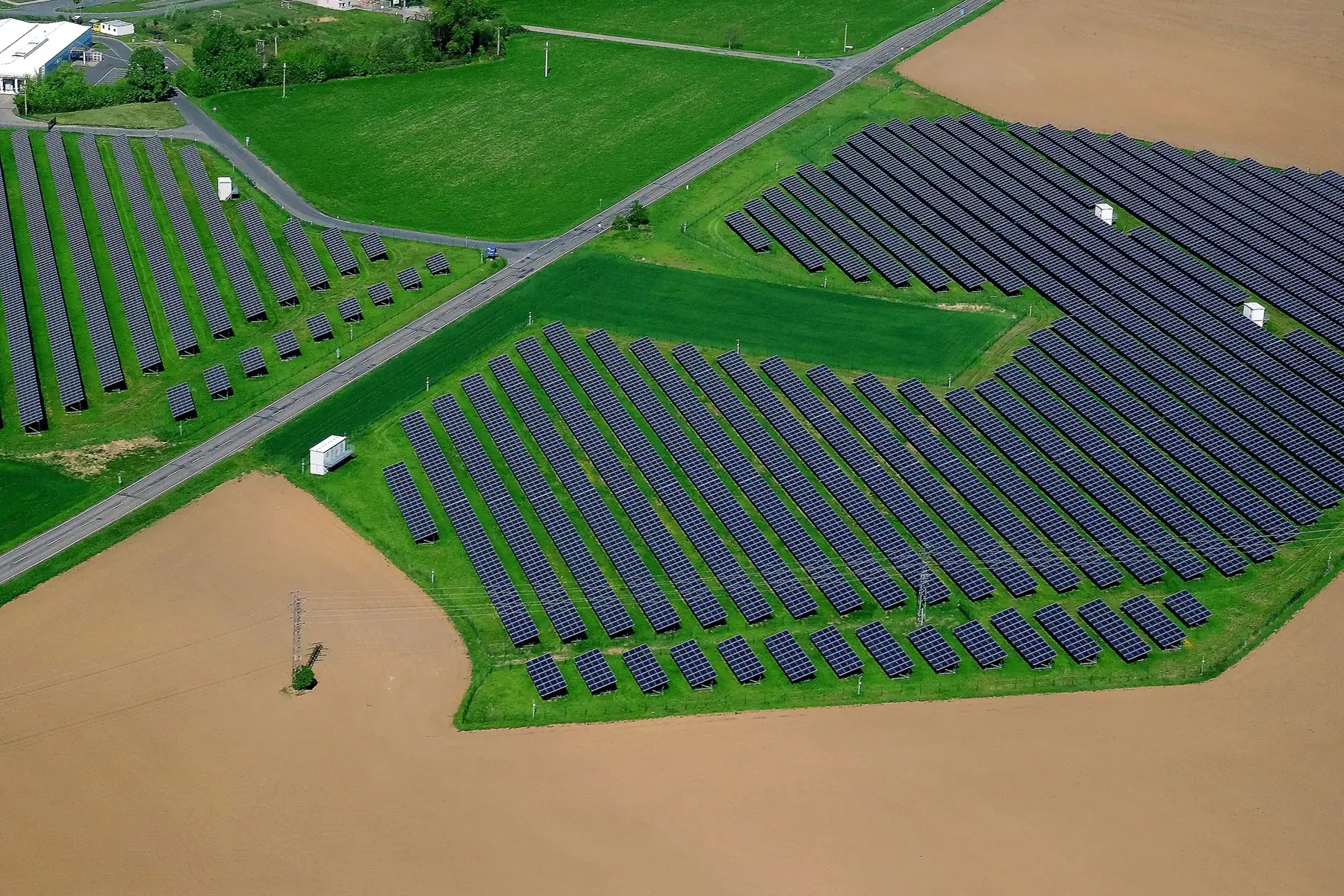 Aerial view of a solar park between fields